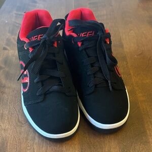Black and Red Heely Voyagers size 4 New without box